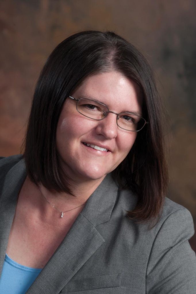 a posed photo of AG Bridget Hill